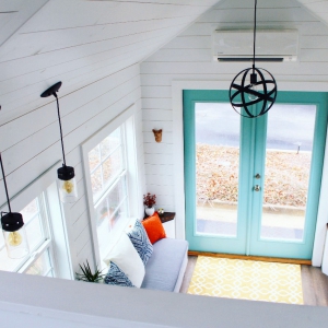 The Sprout from Mustard Seed Tiny Homes - living loom view from loft